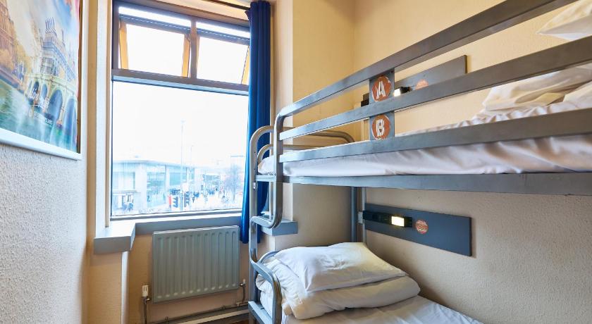 Image of Bed in 4-Bed Mixed Dormitory Room with External Shared Bathroom 1