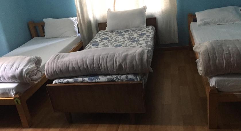 Image of Single Bed in Female Dormitory Room 0