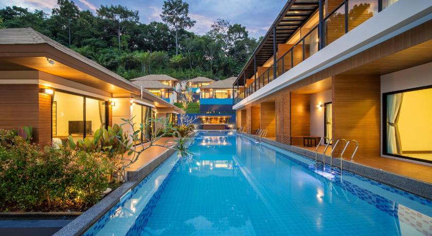 a large swimming pool in a residential area, Chermantra Aonang Resort & Pool Suite (SHA Plus+) in Krabi