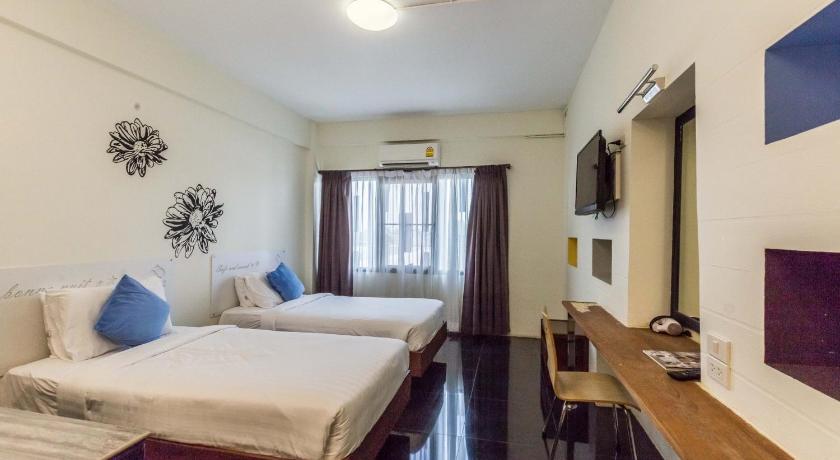 รูปของห้องพัก เตียงแฝด ปลอดบุหรี่ (Twin Room - Non-Smoking) 4