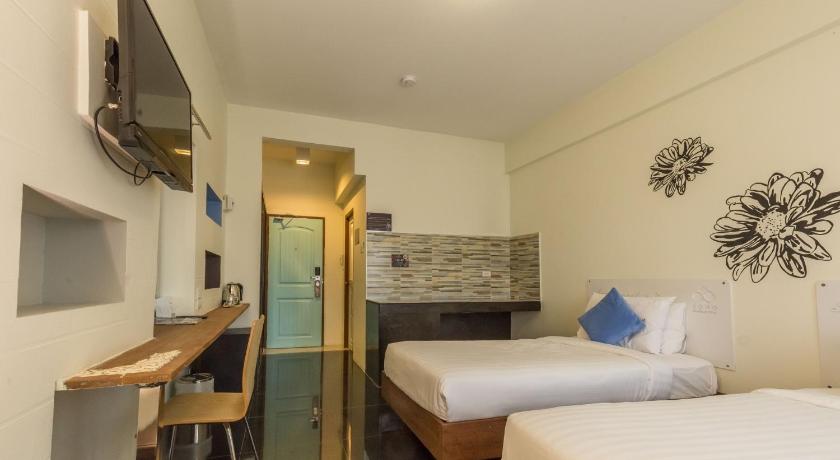 รูปของห้องพัก เตียงแฝด ปลอดบุหรี่ (Twin Room - Non-Smoking) 7
