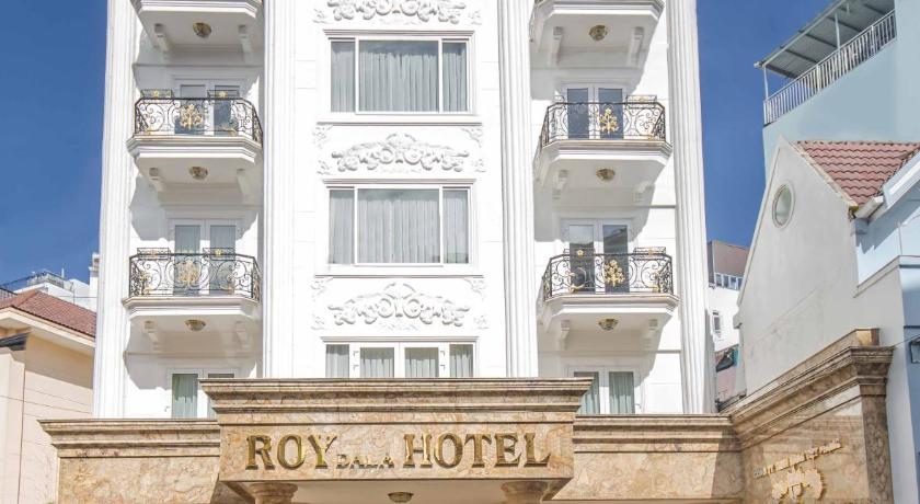 a large building with a clock on the front of it, Roy Dala Hotel in Dalat