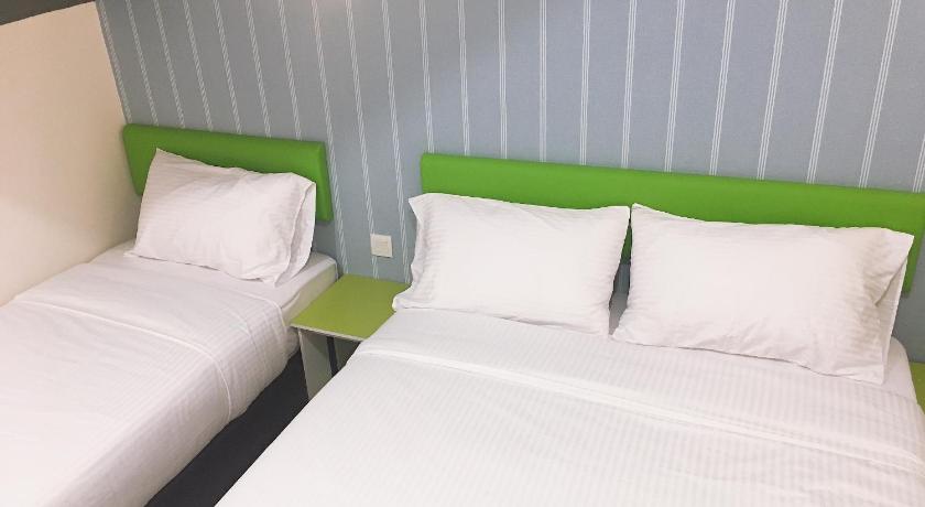 Image of Triple Room with Shared Bathroom 0
