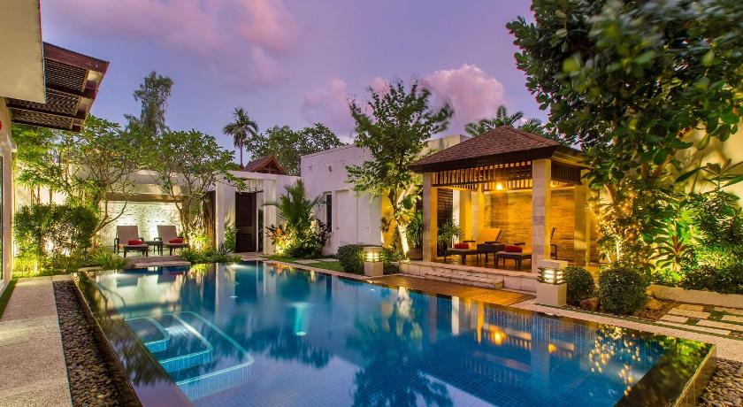 a large swimming pool in front of a house, Splash Beach Resort, Mai Khao Phuket (SHA Plus+) in Phuket