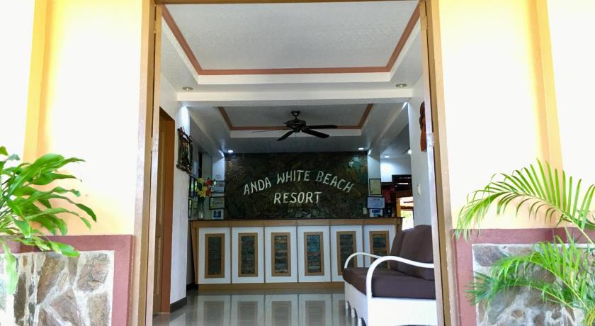 a room with a door leading to a dining room, Anda White Beach Resort in Bohol