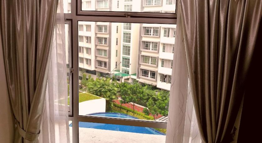 a view from a window of a building with a balcony, 3BR Pool View WiFi Jusco Aeon Ikea Waterpark Tesco in Johor Bahru