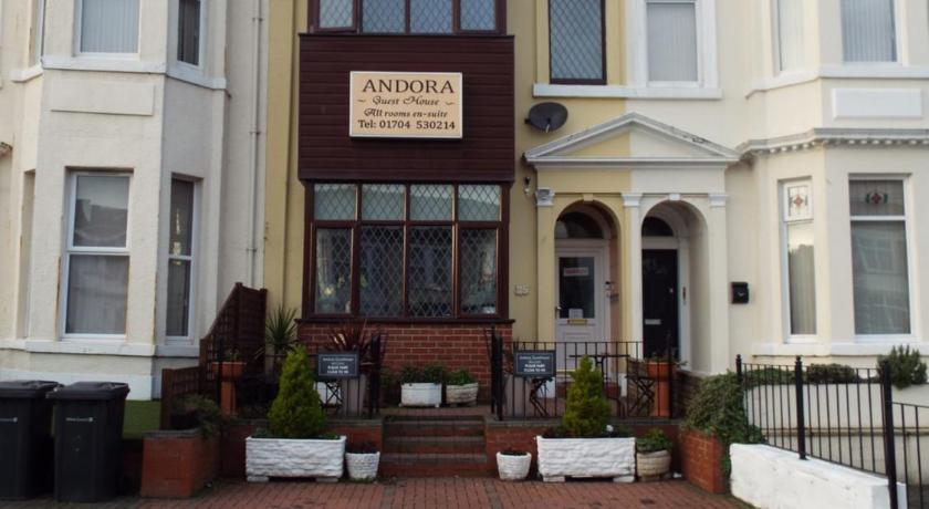 a large brick building with a clock on the front of it, Andora Guest House in Sefton