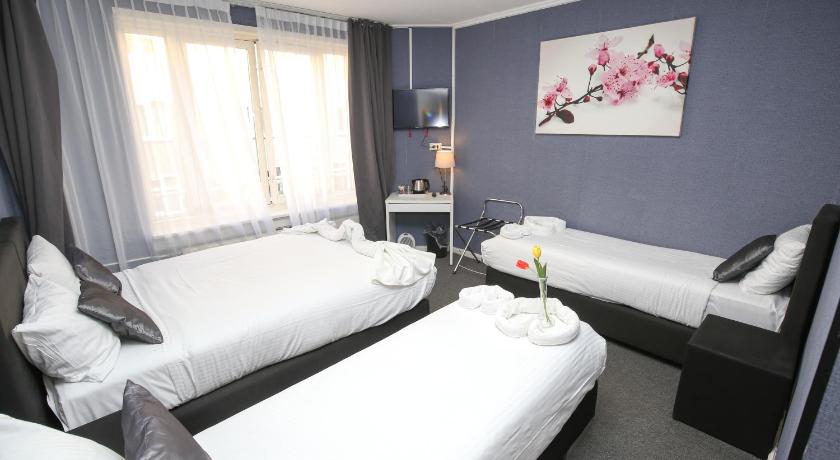Image of Quadraple Room with Private Bathroom 4