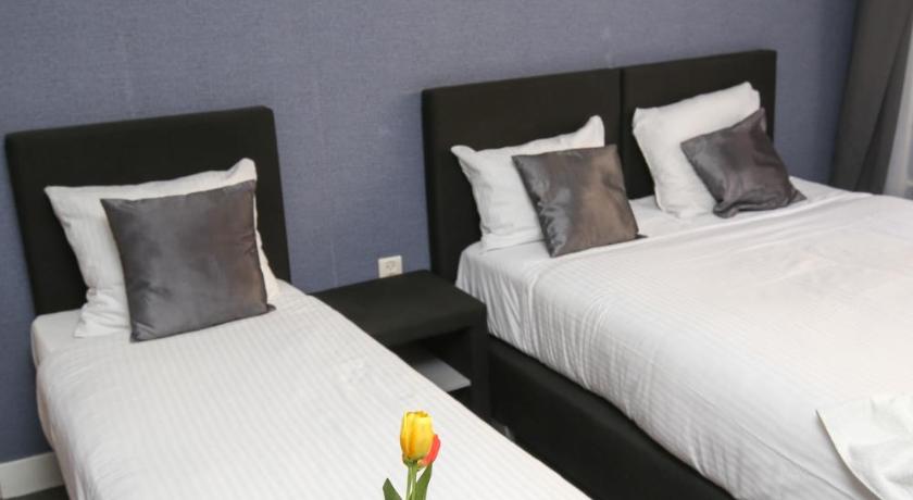 Image of Triple Room with Private Bathroom 7
