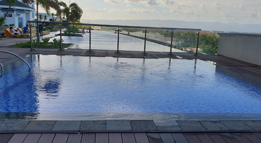 Mactan Newtown Condo with Garden and Ocean View — Hotel in Cebu