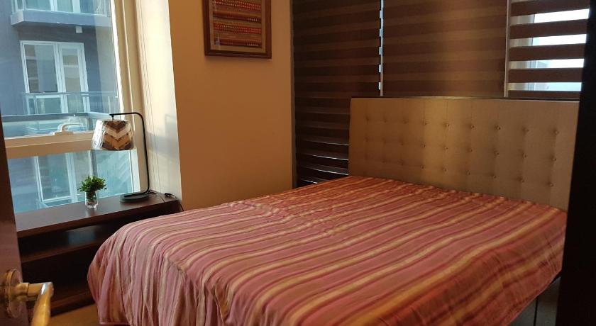 Mactan Newtown Condo with Garden and Ocean View photo