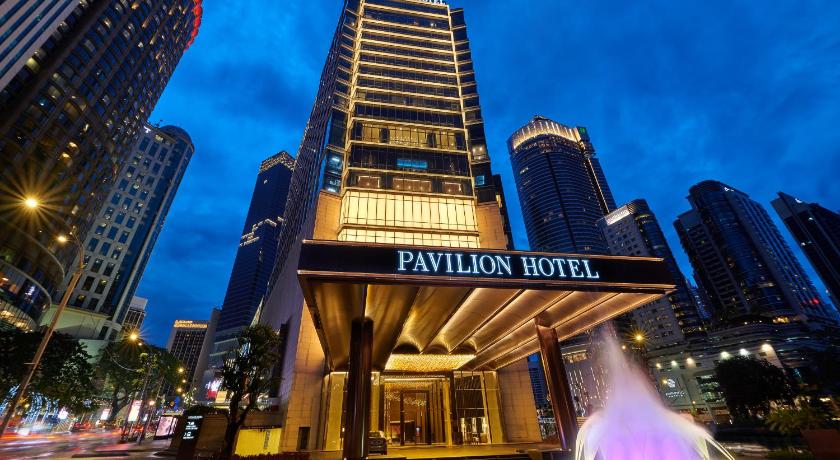 a large building with a clock on top of it, Pavilion Hotel Kuala Lumpur Managed by Banyan Tree in Kuala Lumpur
