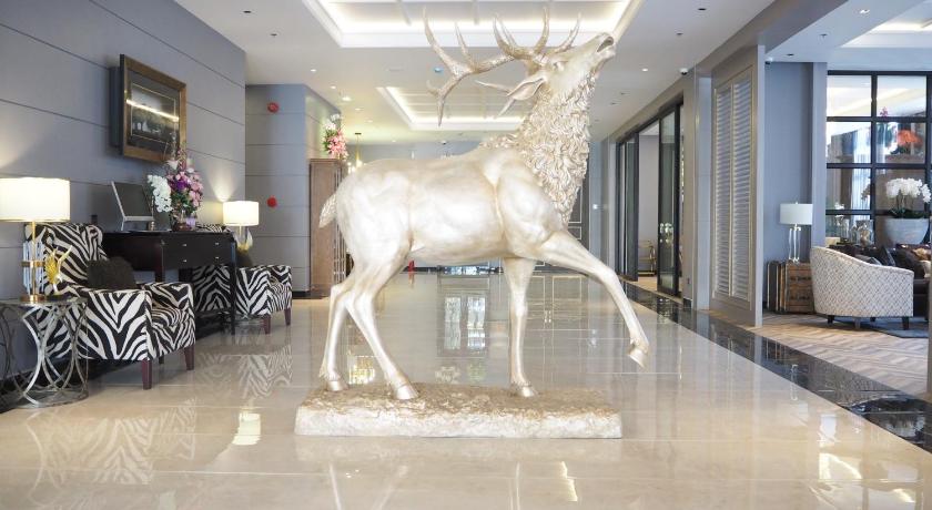 a statue of a horse in the middle of a room, SN CONNX (SHA Plus+) in Pattaya
