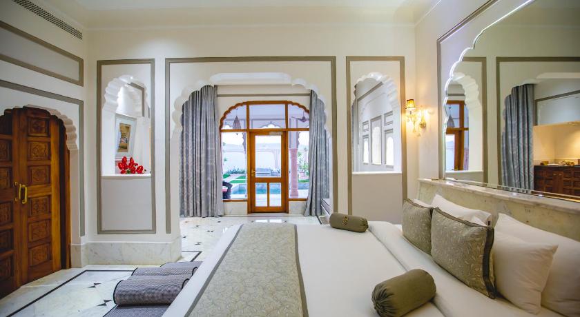 Image of Royal Villa Suite with Private Pool : Welcome drink on arrival, 2 pints of Kingfisher lager beer, One child up to 10 years complimentary without extra bed,20% discount on all resort services,Complimentary Mini Bar 1