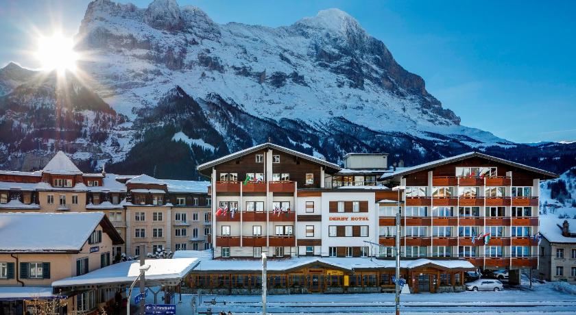 a ski resort with a mountain range and mountains, Derby Swiss Quality Hotel in Grindelwald