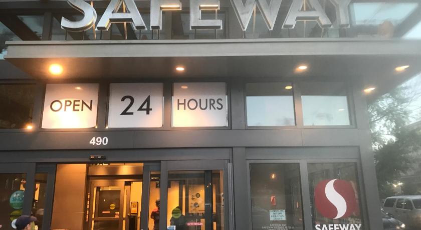 a restaurant with a sign on the side of the building, Steps to Convention Center, Downtown DC, and Metro Station: Private and Comfortable Bedroom/Bathroom in Washington D.C.