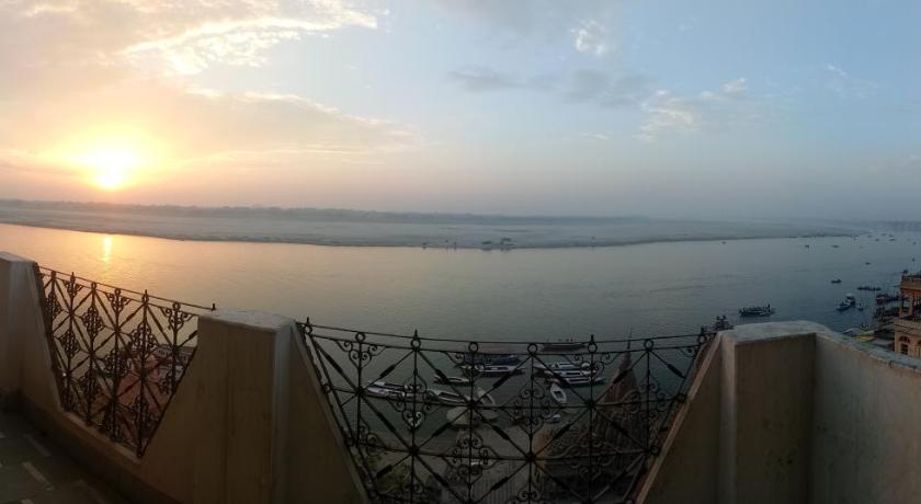 a view from the balcony of a harbor, Scindhia Guest House in Varanasi