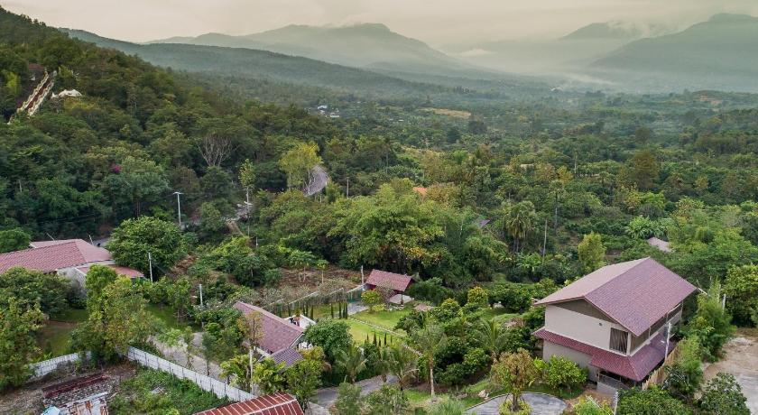 a scenic view of a village with trees, Thanburi Resort in Chom Thong