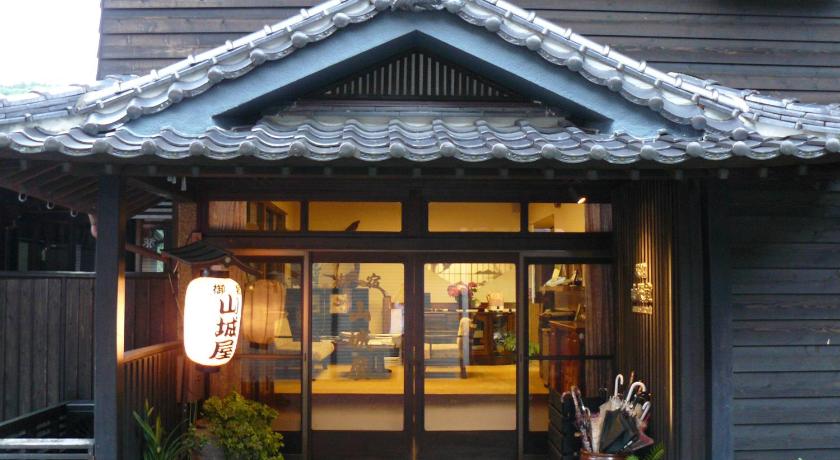 a store front with a large window with a sign on it, Yunohira-Onsen Ryokan Yamashiroya in Yufu