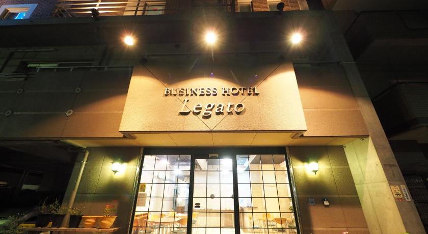 a building with a clock on the front of it, Business Hotel Legato in Tokyo