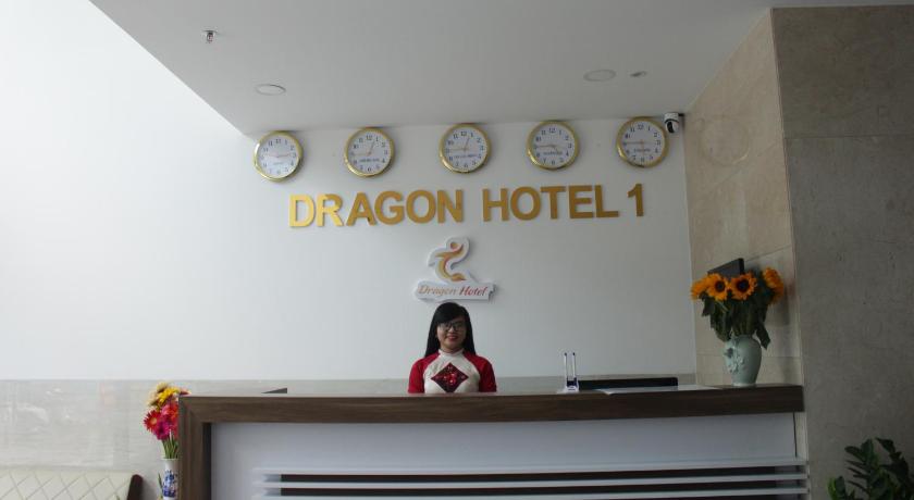 a clock hanging on a wall in a room, DRAGON HOTEL 1 in Ho Chi Minh City