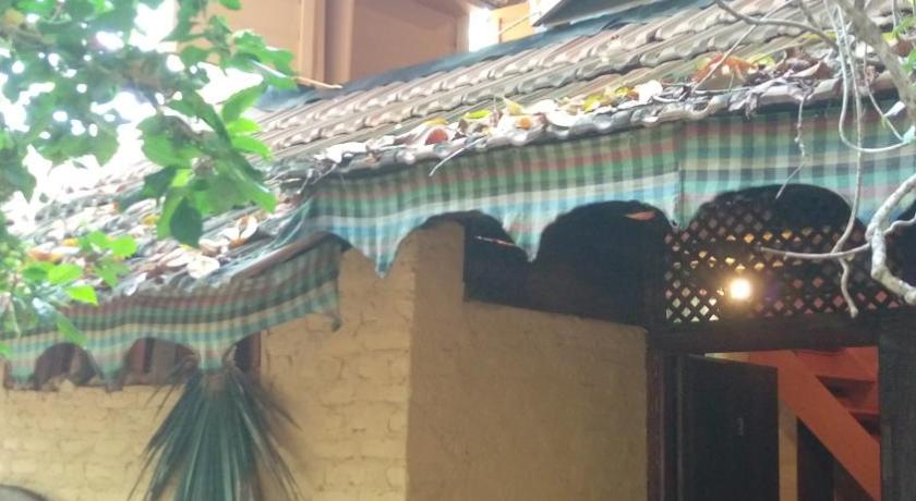 Image of Triple Room with Garden View 1