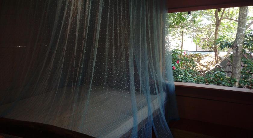 Image of Triple Room with Garden View 2
