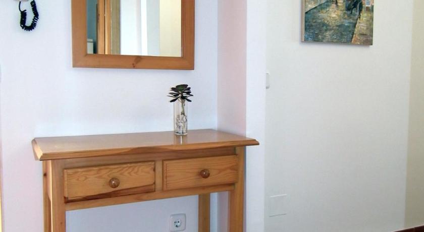 a bathroom with a mirror and a sink, Apartamento Nerja Playa Burriana in Nerja