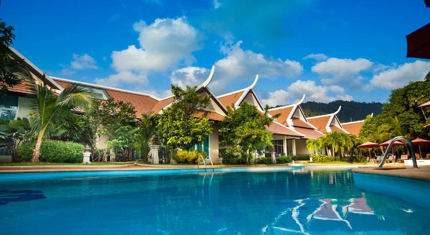 a large swimming pool with a blue sky, Pattra Vill Resort in Koh Samui