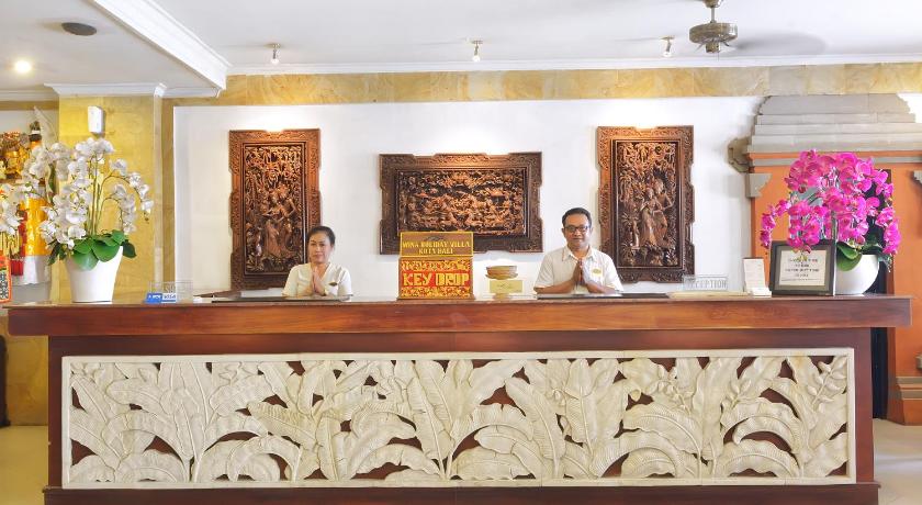 a hotel room with a marble counter top, Wina Holiday Villa Hotel in Bali