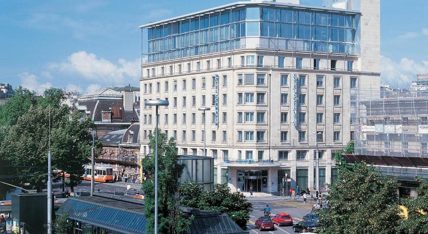 Building opposite our hotel room with attractive facade - housing Louis  Vuitton outlet. - Picture of Hotel International au Lac - Historic &  Lakeside, Lugano - Tripadvisor