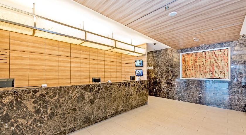 a public bathroom with a wall of marble, Hotel 81 Dickson (SG Clean Certified and Staycation Approved) in Singapore