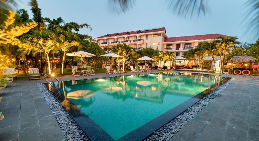 a swimming pool with a pool table and chairs, Phu Thinh Boutique Resort & Spa in Hoi An