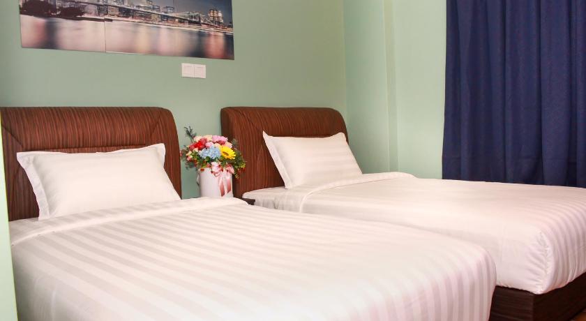 Image of Deluxe 2 Single Bed 1