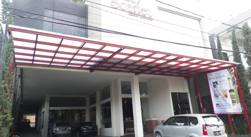 a white car parked in front of a building, Scarlet Kebon Kawung Hotel in Bandung