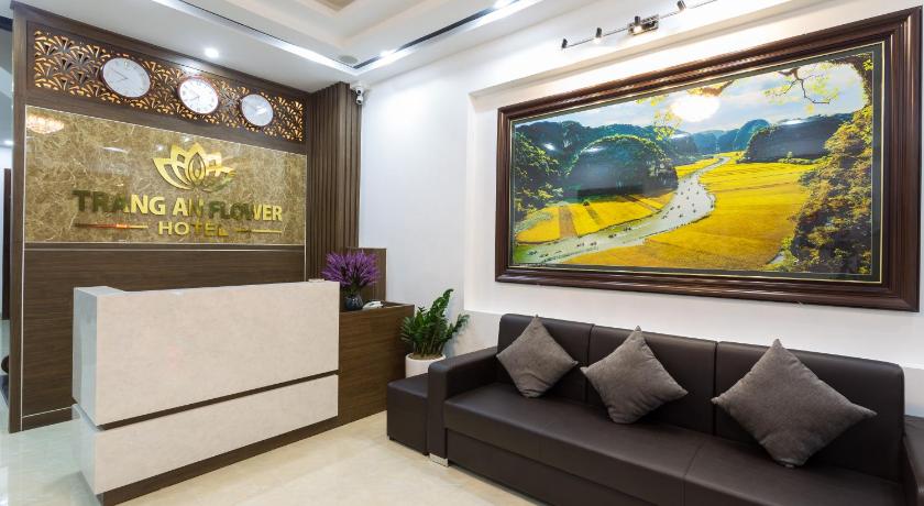 a living room filled with furniture and a painting on the wall, Trang An Flower Hotel in Ninh Bình