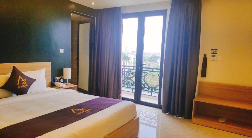 a hotel room with a bed and a window, Azumaya Hotel Hai Phong in Haiphong
