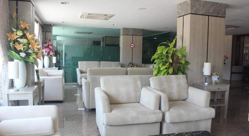 a living room filled with furniture and a couch, M Village Hostel (SHA Extra Plus) in Hat Yai