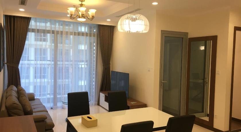 a living room filled with furniture and a tv, Capitalland's Service Apartment Landmark Plus Vinhomes in Ho Chi Minh City