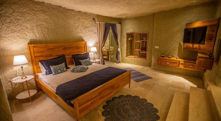 Immagine di Suite Royal in Stile Grotta con Terrazza Privata (Royal Cave Suite with Private Terrace) 0