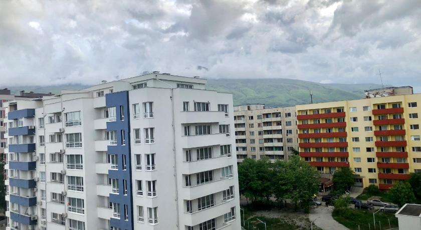 Turquoise and Magenta Apartments photo