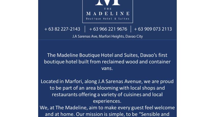a blue and white sign on a blue wall, The Madeline Boutique Hotel and Suites in Davao City