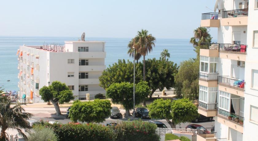 a large building with a view of the ocean, Albaida II 3C in Nerja