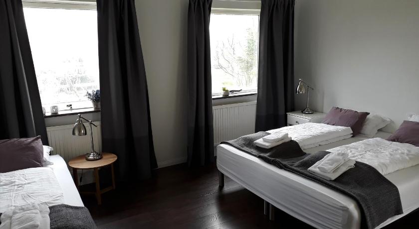 Image of Triple Room with Private Bathroom 0