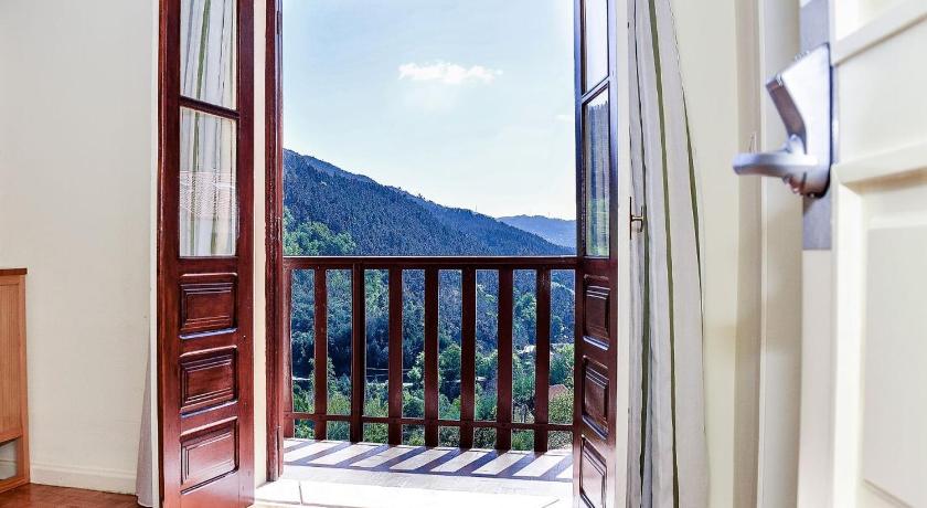 รูปของห้องเตียงใหญ่พร้อมระเบียง (Double Room with Balcony) 7