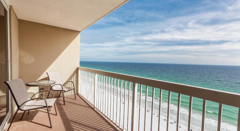 a view from a balcony of a beach with a view of the ocean, Pelican Pointe in Destin (FL)