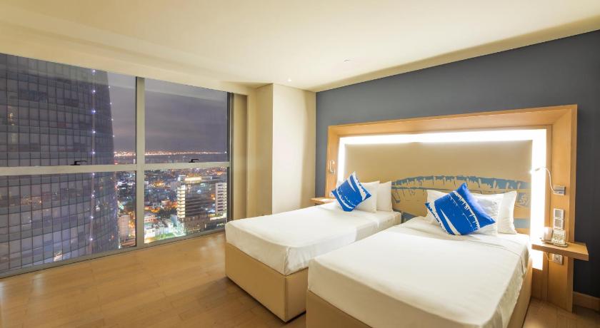 Image of Deluxe Room, city view - 2 single beds 6