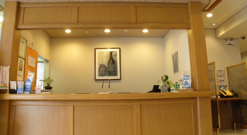 a kitchen with a large mirror above the counter, Hotel Benex Yonezawa in Yonezawa