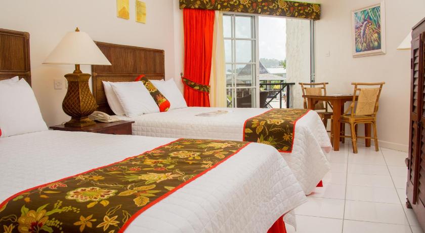 รูปของห้องเตียงใหญ่หรือเตียงแฝดพร้อมวิวสวน (Double or Twin Room with Garden View) 1