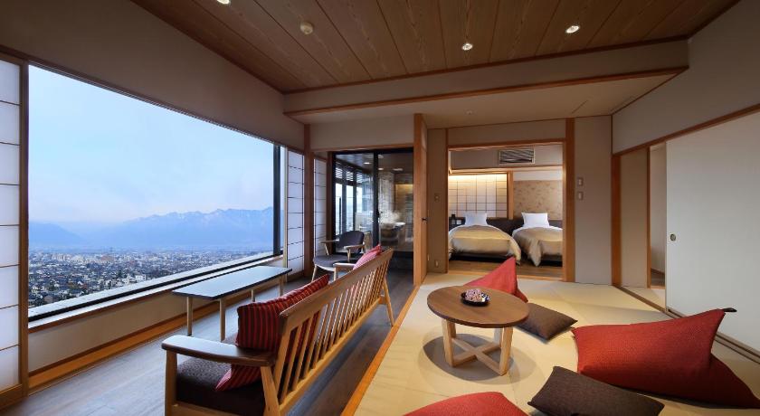 a hotel room with a view of the ocean, Hotel Shoho in Matsumoto